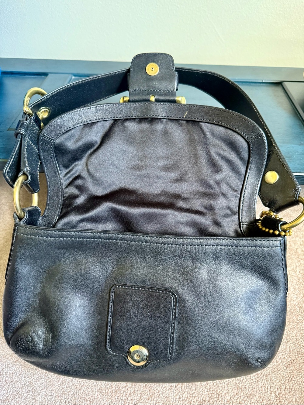Black Leather Coach Shoulder Bag with Gold Buckle Accent - Picture 7 of 9